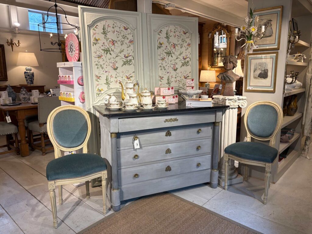 Freshly staged vignette with a new chest and paired chairs